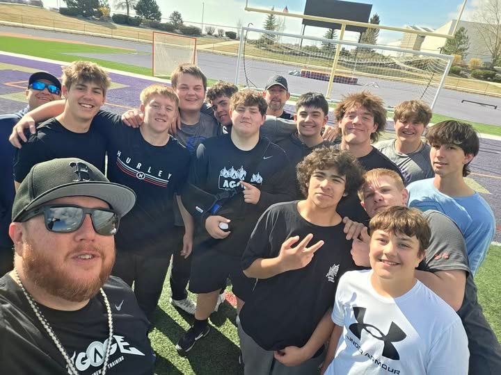 Agoge coaching staff with athletes